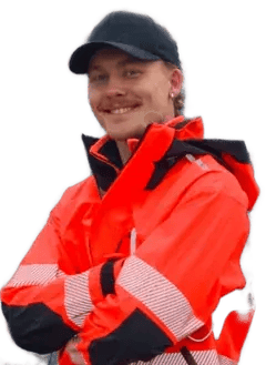 Smilende håndverker fra Byggdriften i arbeidsjakke