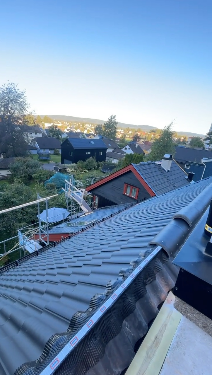 Ferdig tak på Grefsen med ny takstein og pipebeslag